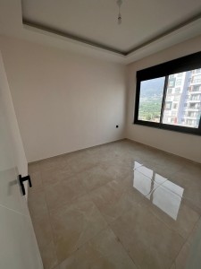 Alanya Mahmutlar'da  Havuz ve Doğa   Manzaralı Satılık 1+1 Daire